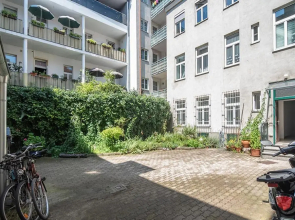 Colorful Apartment Facing Green Courtyard