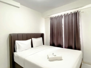 Warm and Homey 2BR at Podomoro Golf View Apartment