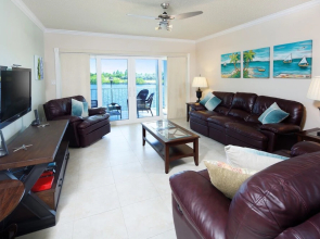 Sunrise Waterways by Cayman Vacation