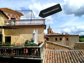 Mansarda con solarium panoramico su centro storico di Sarteano vicino alle famose terme della Val d'Orcia