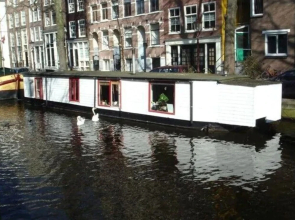 Houseboat in Amsterdam Old Center