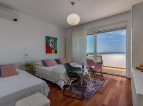 Terra Magica Deluxe Apartment OR Room with Private Parking, Terrace and Sea View