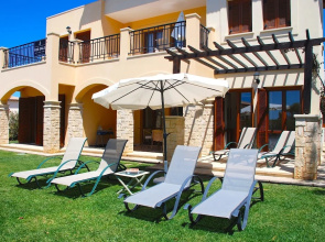 Charming 2 bedroom ground floor apartment 'CB01' - with private garden, communal pool and resort facilities, Theseus Village on Aphrodite Hill