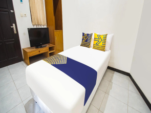 SPOT ON 90902 Marhaban Guesthouse Syariah