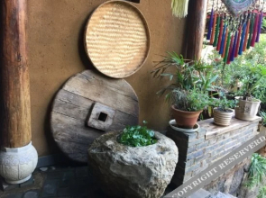 Puzhehei Yeniu Buluo Inn