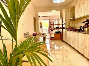 Private bedroom with balcony in a shared apartment at the Bay of Xlendi