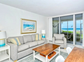LaPlaya 101A Step out to the beach from your screened lanai Light and bright end unit