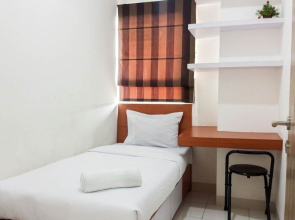 Comfort And Minimalist 2Br At Candiland Apartment