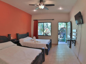 Affordable Comfort in a 2-bed Hotel Room in Potrero With Pool - TV and AC