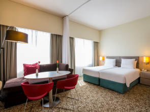 Отель Novotel Suites Mall Avenue Dubai