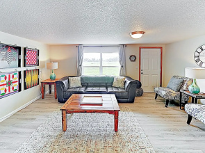 New Listing! Spacious Riverfront Gem W/ Firepit 3 Bedroom Home