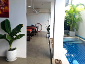 One World One Home Naiharn Hotel