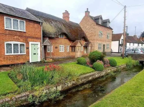 Village Period Cottage Next to a Idyllic Stream