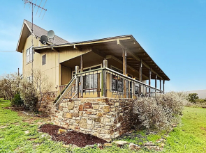 New Listing! 1-acre Lakefront W/ Fishing Dock 2 Bedroom Home