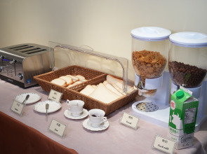 The new is Woody House hotel.