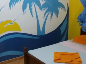 Malika's Yellow House