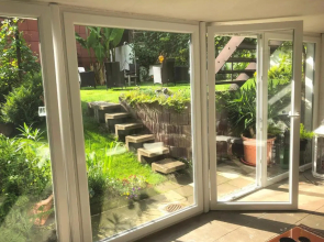 Ferienwohnung Apartment Dettum mit eigenem Bad, Kochnische und Wintergarten