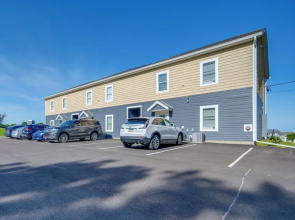 Golf Course View: Centrally Located Condo in Erie