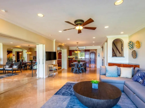 Stylish Split-Level Condo with a Shaded Terrace, Direct Beach Access, and Resort-Style Community Amenities