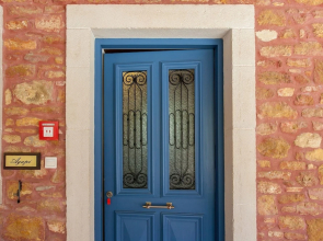 Dine on the Generous Veranda at a Rustic Stone Getaway