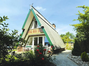 Thatched Holiday Home in Freest With Terrace