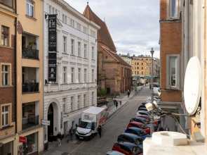 Studio centrum Poznań by Renters