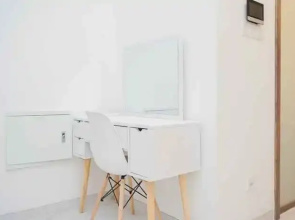 Cozy Stay and Comfy Studio Room at Sky House BSD Apartment By Travelio