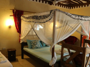 Room-a Wonderful Beach Property in Diani