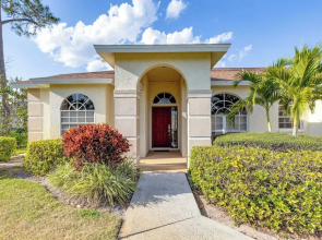 Private Pool, Pond Views, & Bonus Lounge in Gated Naples Community Drive to Dining & Sand