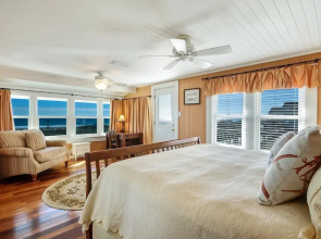 Rustic Ocean Front Cottage by RedAwning