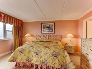 Beach Condo Miles-long Views Sand and Sea, Access to Private Fishing Pier by RedAwning