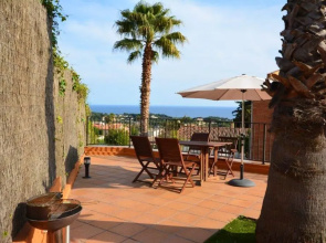4 bedrooms house with sea view enclosed garden and wifi at Lloret de Mar 1 km away from the beach