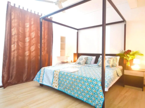 One bedroom appartement at Pereybere 500 m away from the beach with shared pool enclosed garden and wifi