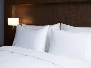 Отель Naumi Dubai