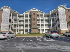Magnolia Pointe 305-4820 Condo