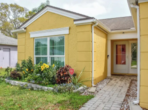 Lanai & Pond at Tranquil Bradenton Retreat!