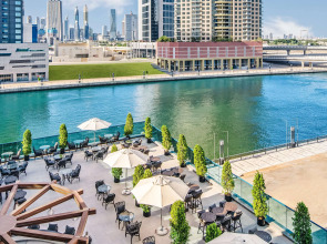 Отель Radisson Blu Hotel, Dubai Canal View