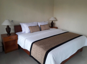 Pemuntalan Guesthouse by WizZeLa