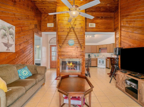 Experience Dolphin Cove Canal House in Freeport