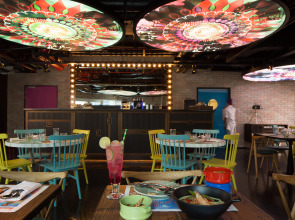 Отель Naumi Dubai