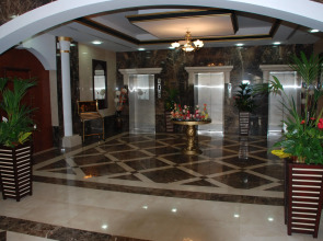 Отель Wescott Plaza Hotel Apartment