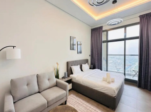 Upscale Apartment at Oval Tower Near Downtown with Balcony and Parking by Belvilla