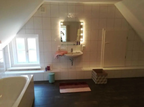 Ferienwohnung am Kirchplatz 25561