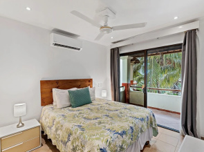 Colorful & Private 2-Bedroom Condo Just a Short Walk from the Beach