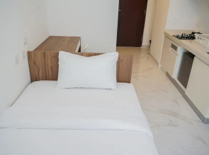 Nice And Cozy Studio At Sky House Bsd Apartment