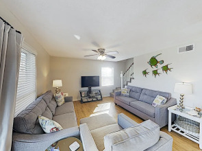 New Listing! Coastal Gem W/ Porch - Steps To Beach 4 Bedroom Home