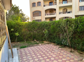 Comfortable apartment with a private garden near AUC شقه فندقيه