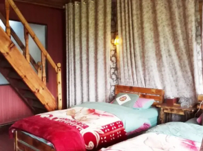 Luguhu Lakeside Apu Guest House