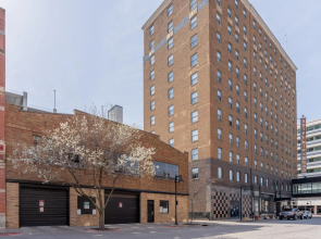 King Bed | Garage | Wifi | Skywalk Access & More!