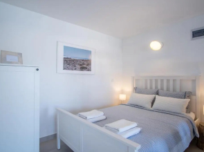 A White Cliffside Studio